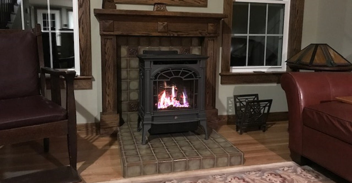 Handmade tiles in tan and brown glaze for fireplace by Campbell Tileworks.  Brownstone glaze.