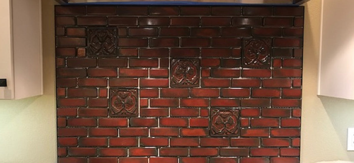 Handmade kitchen backsplash tiles in red glaze called Old World Red by Campbell Tileworks.